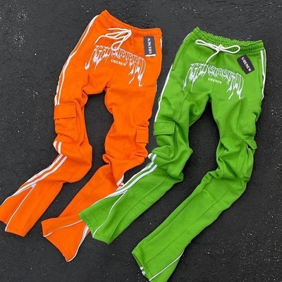 comprar Calças de treino de algodão para homens, mulheres, bolsos de fecho, calças de carga, calças empilhadas, calças de treino com listras, online manufacture